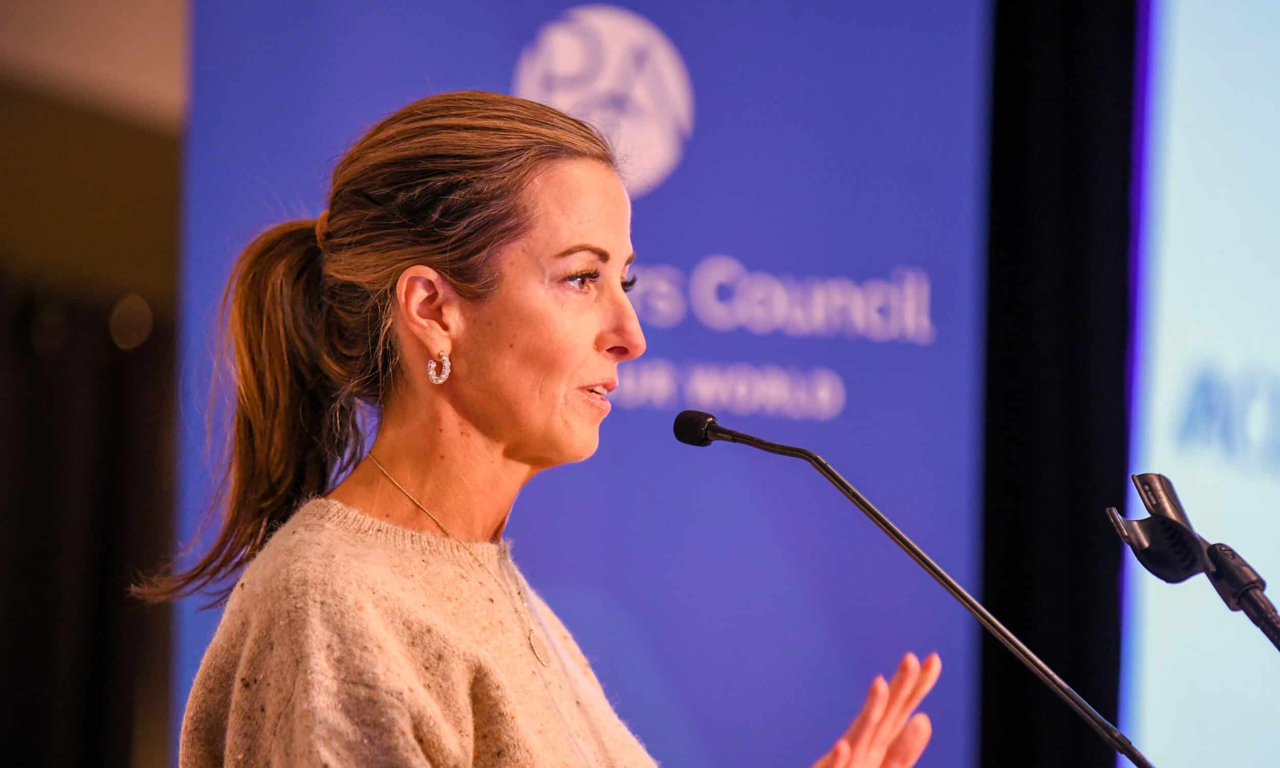 A speaker addressing the room